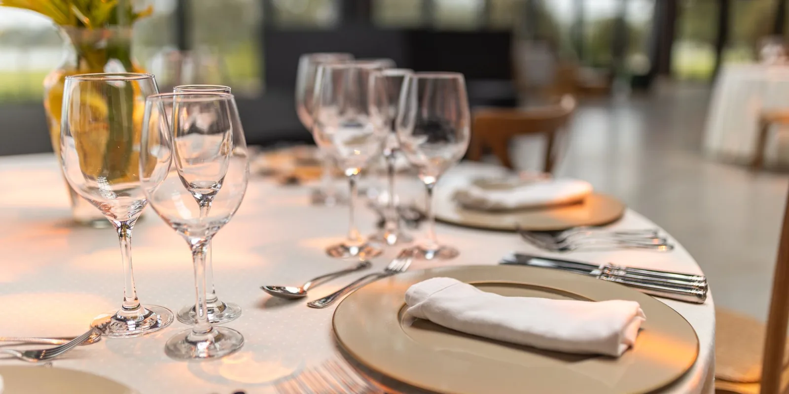 Sophisticated table setup with glassware and napkins for fine dining experience