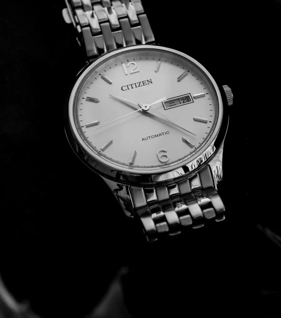 silver and white analog watch